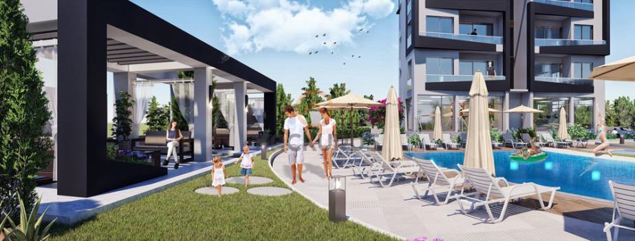 Nowoczesny luksusowy apartament 1+1 na sprzedaż w Iskele, w odległości spaceru od plaży